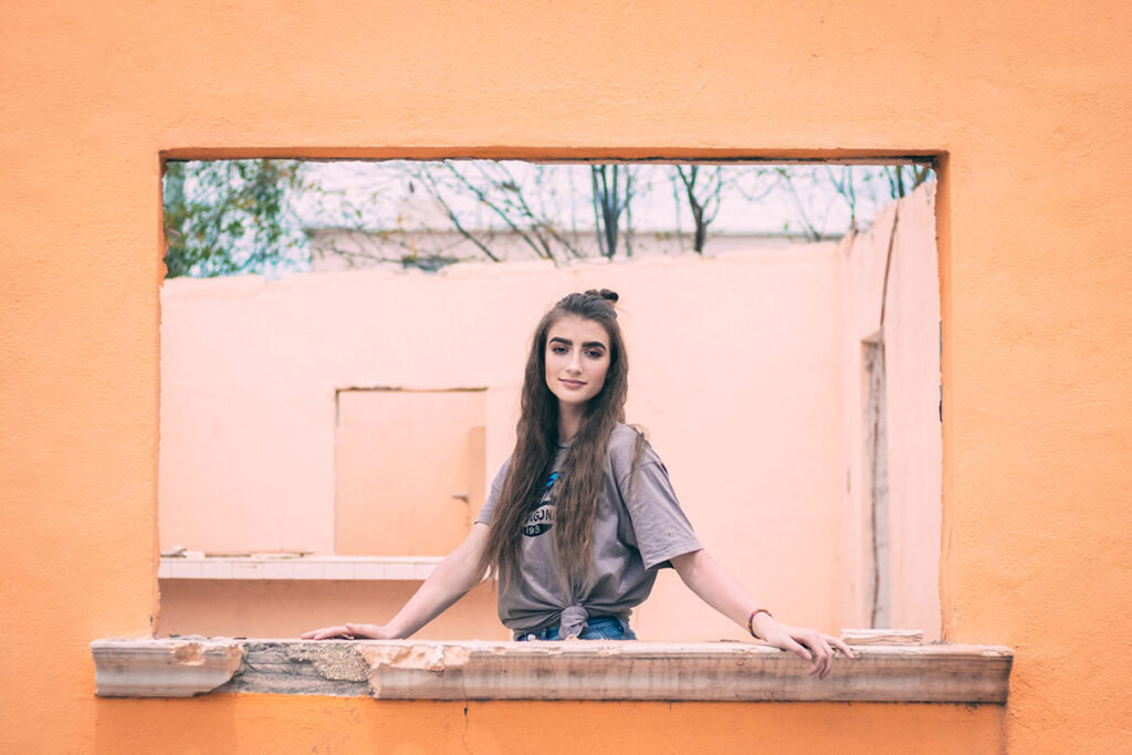 girl looking out the window portrait by Kiriell Visuals