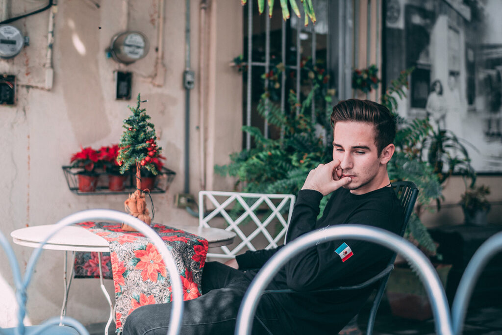 Young Man sitting outside by Kiriell Visuals